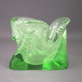 High mid-century modern ashtray in apple green glass with intricate and fine internal netting.