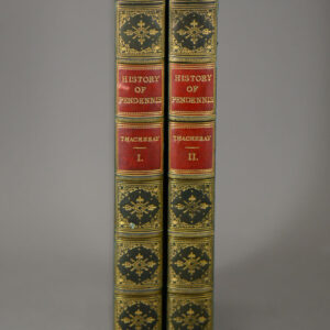 Pair (volume 1 & 2) of the History of Pendennis by Thackeray in green and red leather.