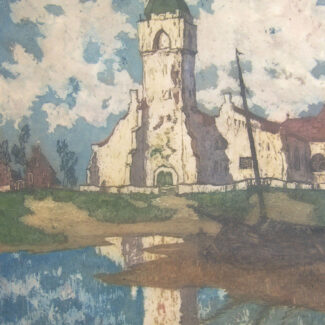 The facade of Katwijk Church reflects in a body of water