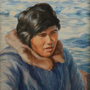 A young Inuk man with black hair sits in a light blue parka, the background is an acy field of white and blue