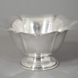 Raised lobel sterling silver bowl with rolled collar foot