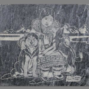 A square piece of soapstone engraved with an image of a young inuk girl with two husky dogs in front of an ice flow and distant rocks