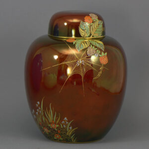 A ginger jar with rouge royale ground and decorated in gilt spider webb decoration