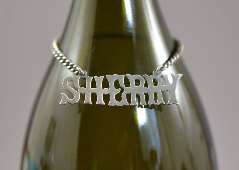 roden brothers sterling silver sherry decanter label